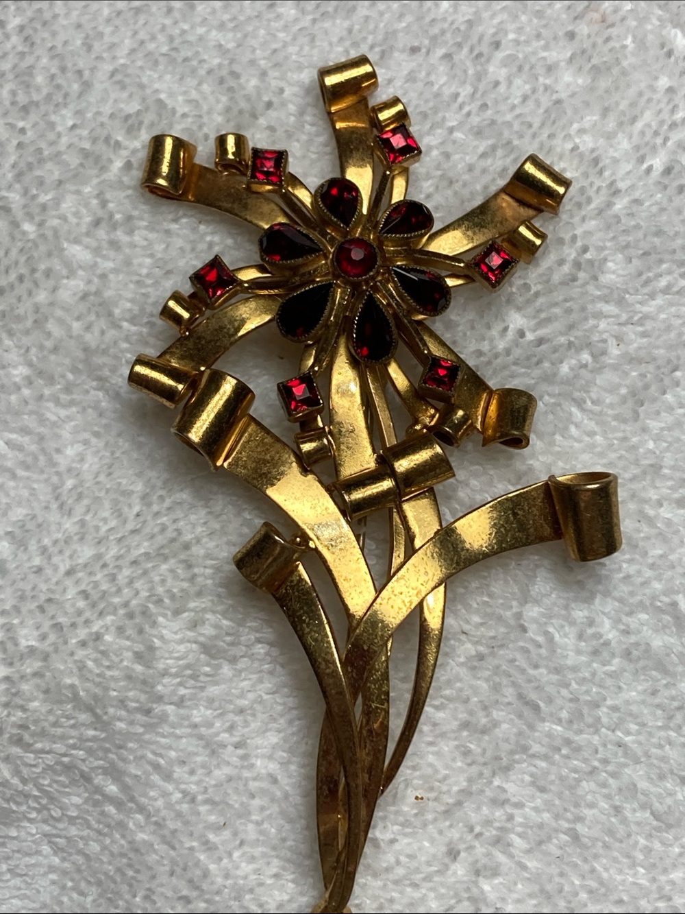 Gold-tone Floral Spray Brooch with Red Glass Stones